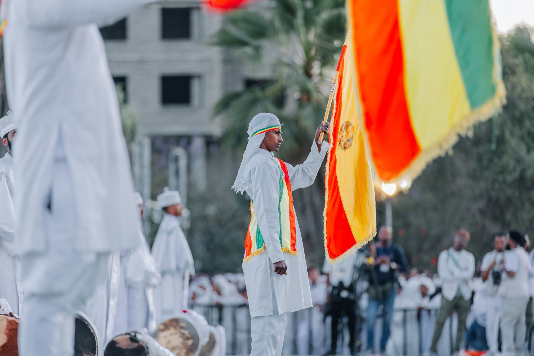 An Ethiopian ceremonial guard carrying the national flag at a cultural gathering in Addis Ababa