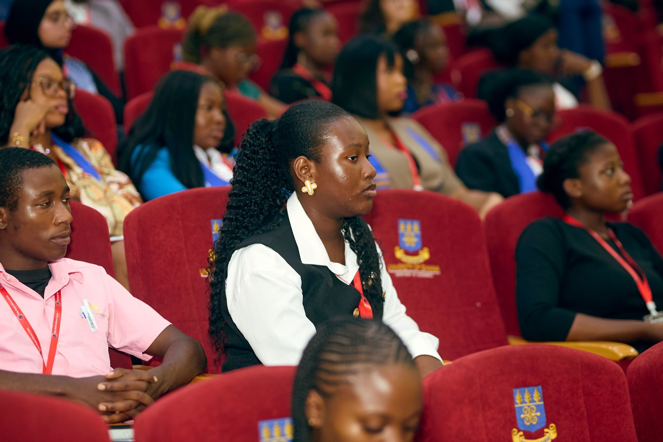 YMAU V delegates listening during a practitioner programme in the auditorium