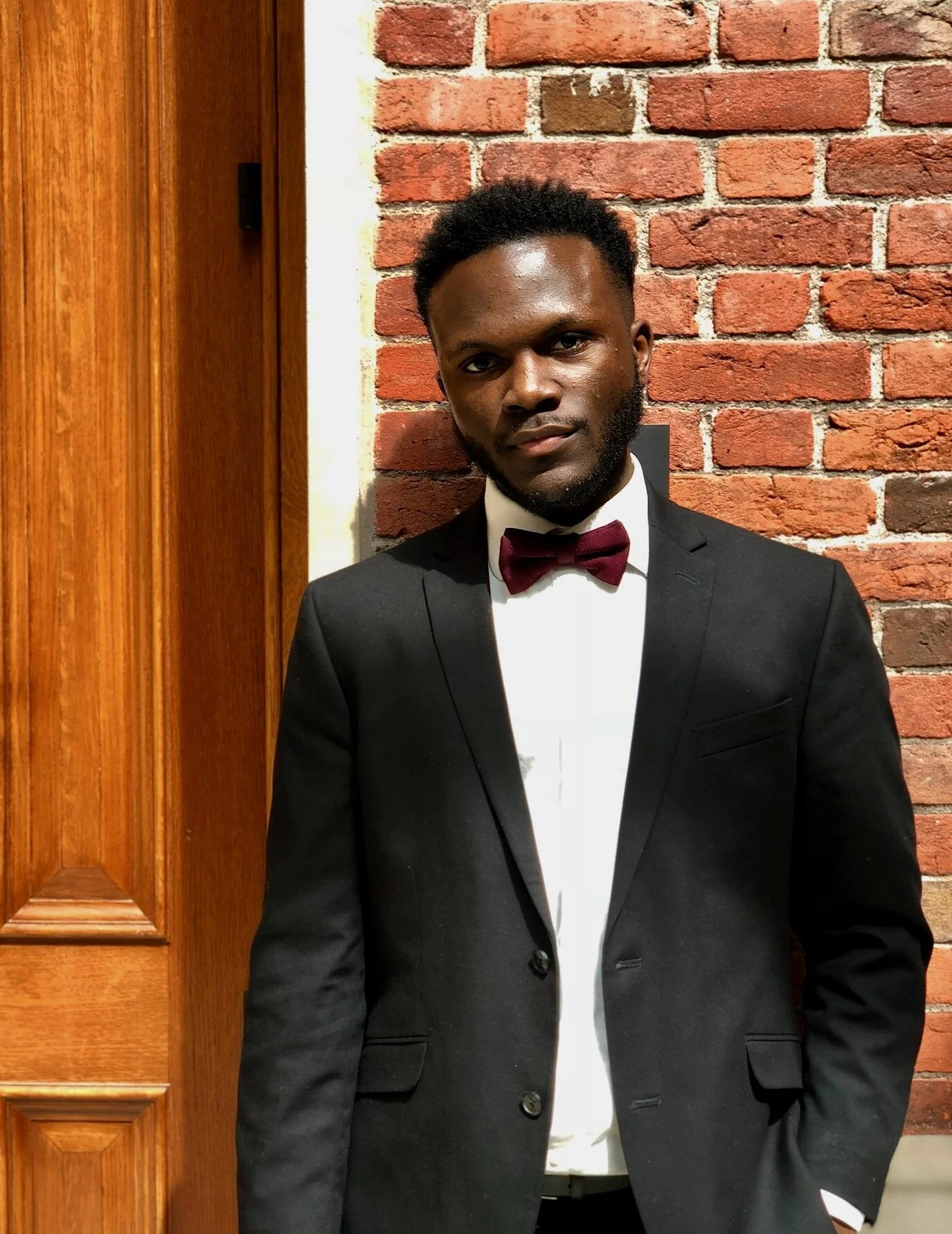 Portrait of YMAU co-founder Richard Mbouombouo