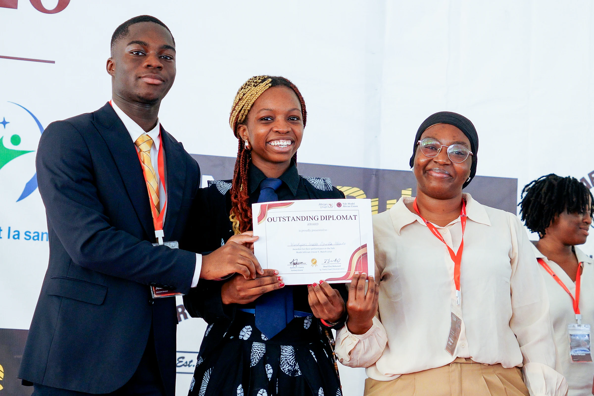 A delegate receiving recognition at the YMAU V awards ceremony