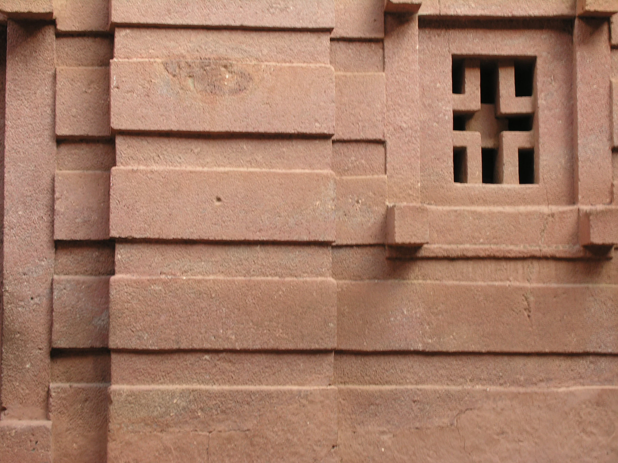 Stone windows carved into Biete Amanuel in Lalibela, Ethiopia