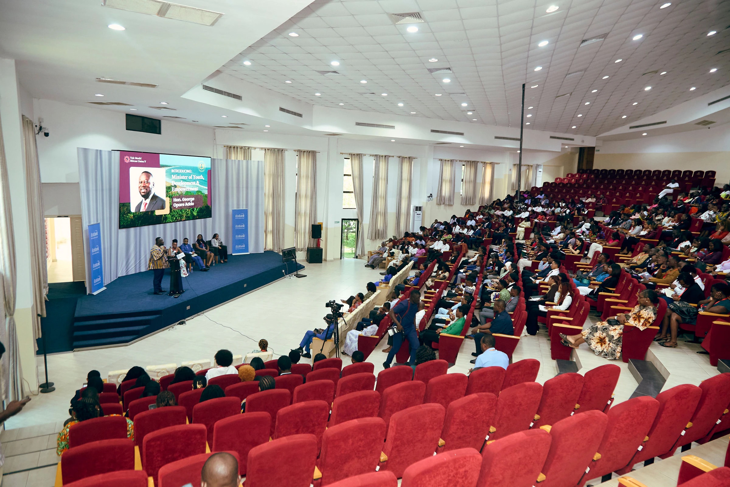 Delegates seated in the auditorium during the YMAU V opening programme